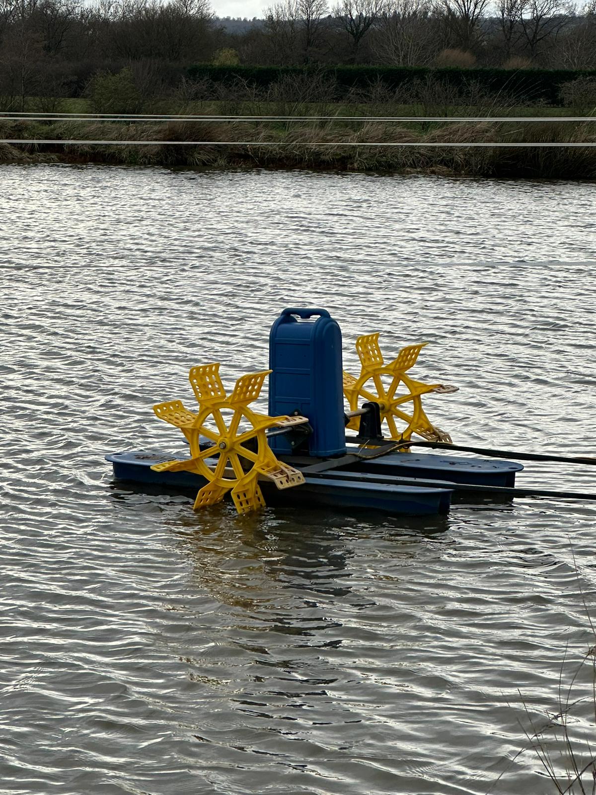 paddle wheel aerator in use
